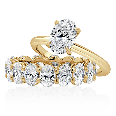Oval Engagement with Matching Oval Cut Diamond Band