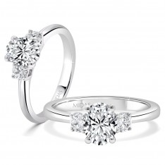 Trilogy Oval with Round Cut Diamonds