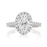 Oval Cut Engagement Ring With Seamless Claw Set Halo